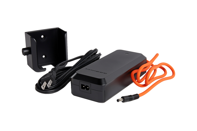 Detail view of Rad Battery Charger, cables, and wall mount